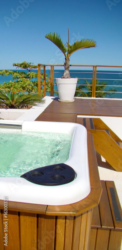 modern spa jacuzzi outdoors under beautiful blue sky