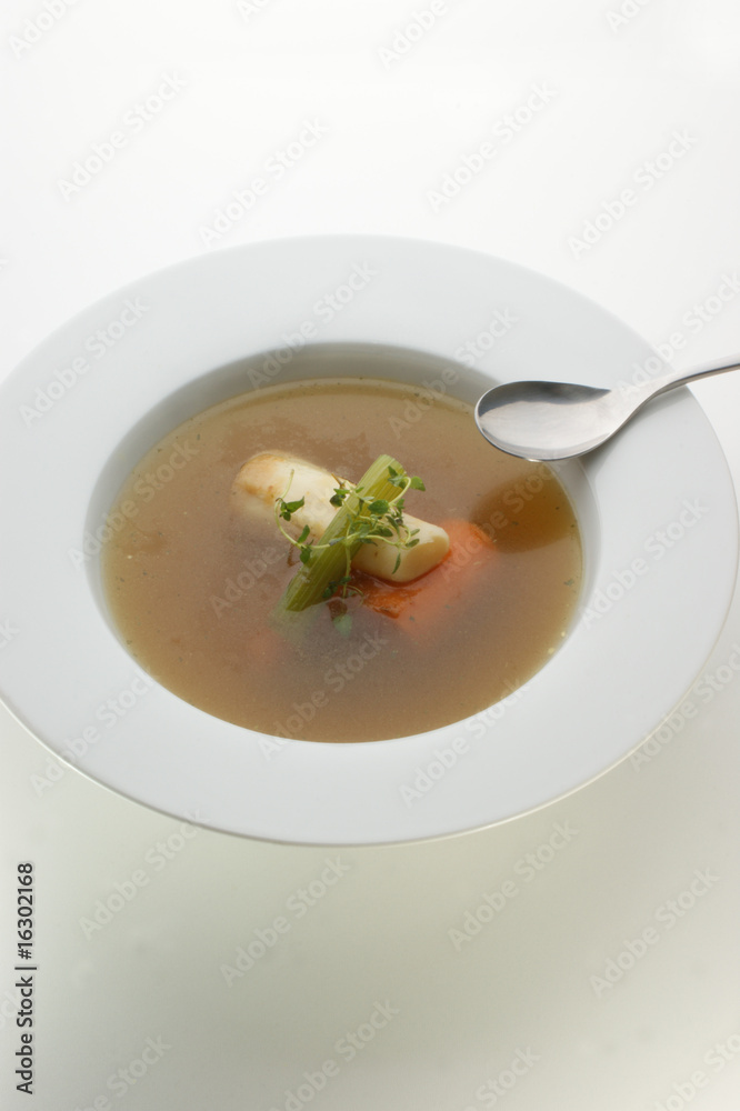 healthy soup with organic vegetables and a spoon healthy soup with organic vegetables and a spoon