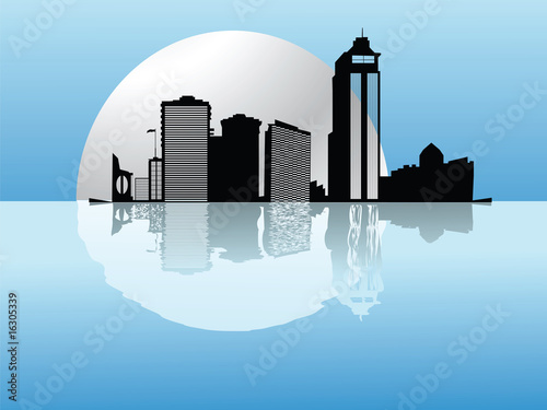 Fantastic moon rising above skyscrapers silhouettes