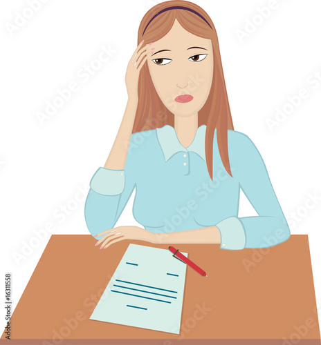 Sad woman sits at a table