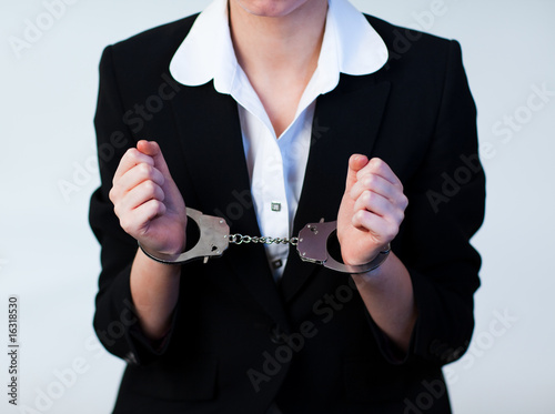 Business Woman in Handcuffs photo