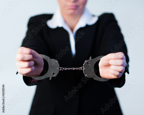 Obraz na plátně Business Woman in Handcuffs