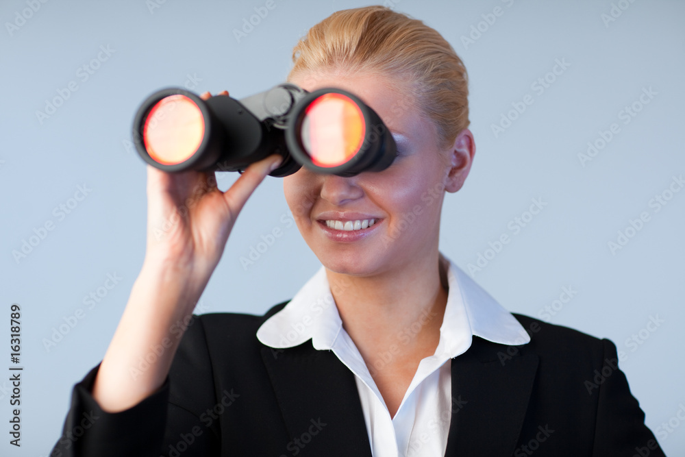 Happy business woman looking outwards Happy business woman looking outwards