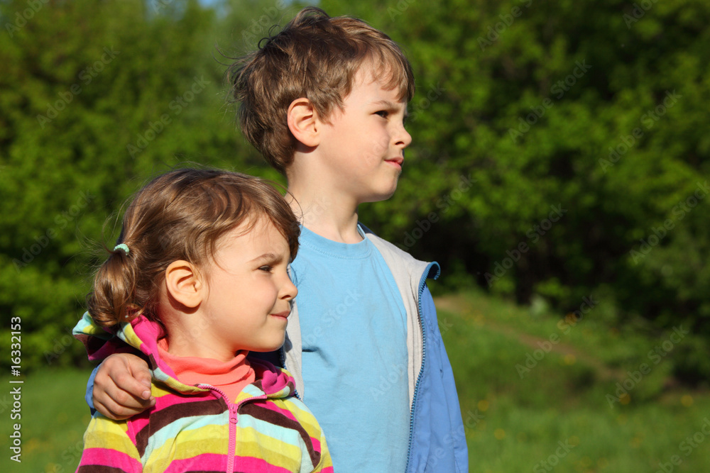 boy embraces girl for shoulder outdoor boy embraces girl for shoulder outdoor