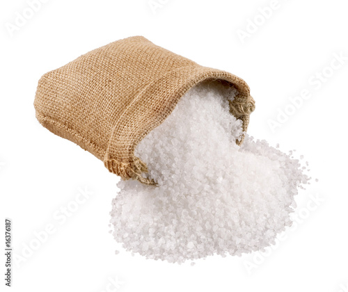 Fototapeta Naklejka Na Ścianę i Meble -  Sea salt coming out of a burlap sack