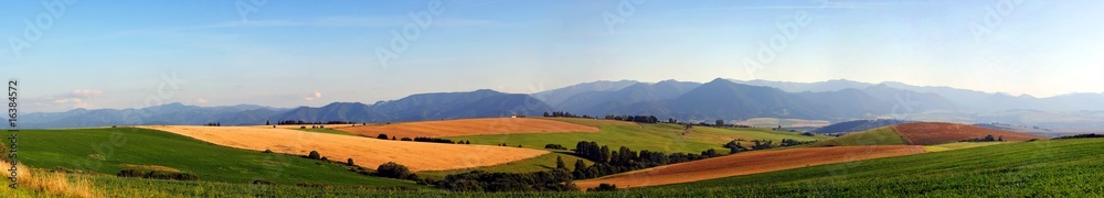 Panorama of meadows and fields in evening Panorama of meadows and fields in evening