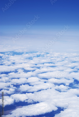 The sky with clouds from an altitude of flight