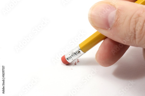 Pencil erasing on paper.