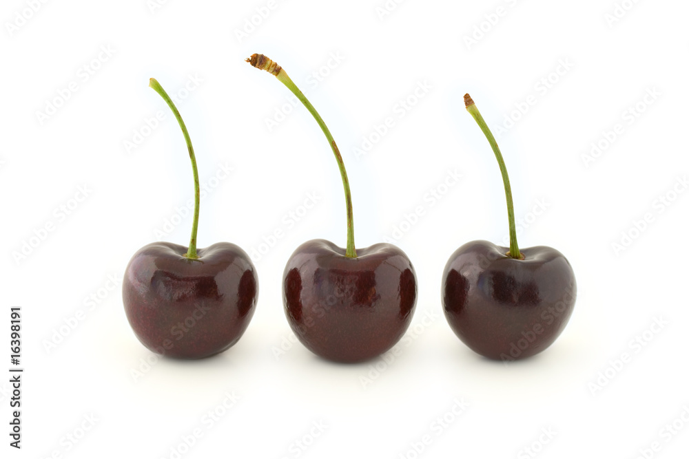 Three red cherries