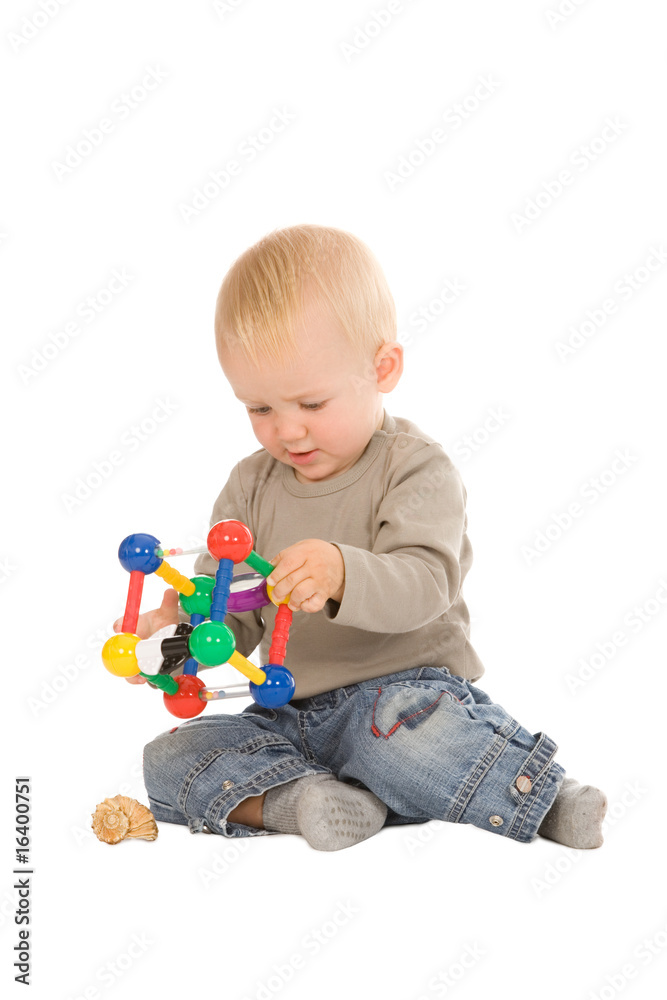 portrait of the young boy playing with the educational toys portrait of the young boy playing with the educational toys
