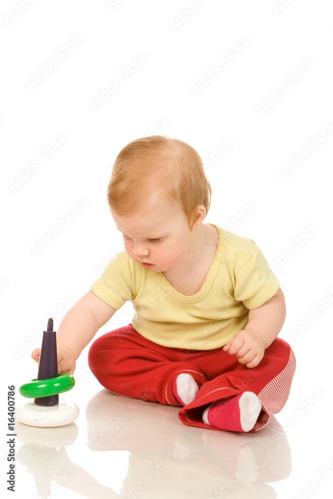portrait of the young girl playing with a educational toy portrait of the young girl playing with a educational toy