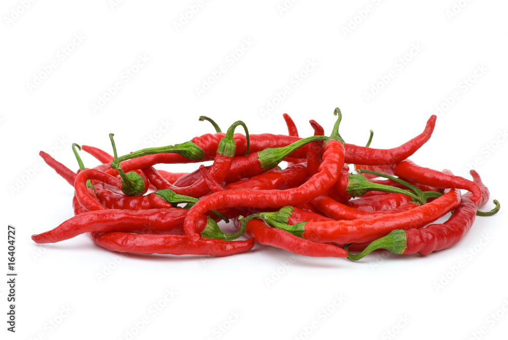 Pile of long curved red hot chili peppers