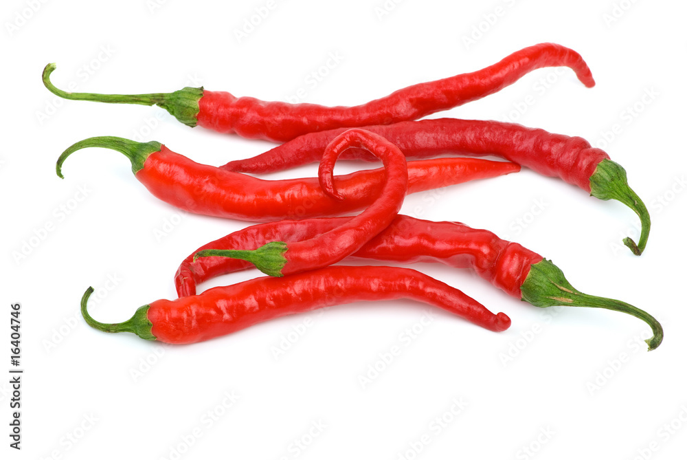 Some long curved red chili peppers