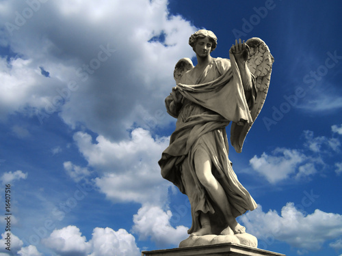 Photos Flying in a blue dream with angel statue