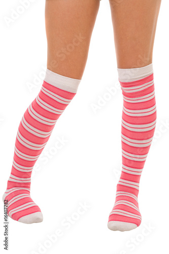 woman legs in color pink socks isolated
