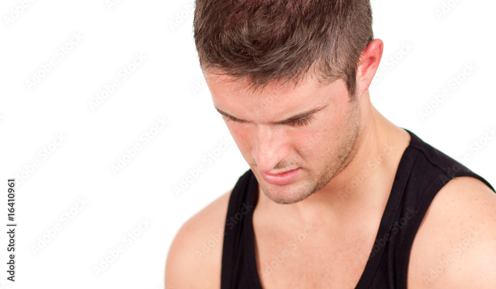 Obraz premium Portrait of anathletic man isolated on a white background