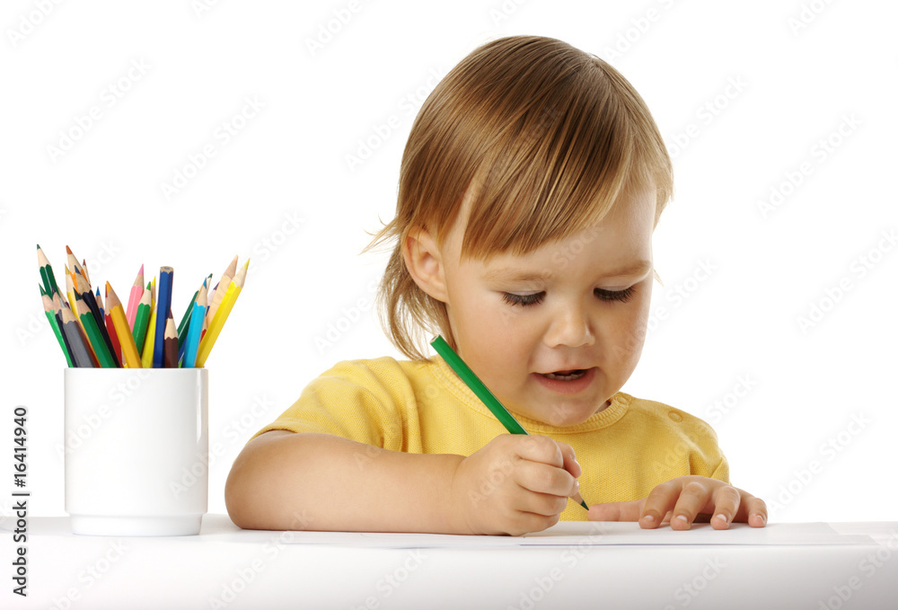 Child draw with green crayon Child draw with green crayon