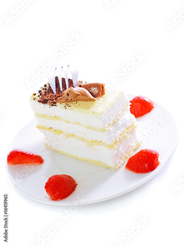 Sponge cakes  on plate with strawberry . Isolated