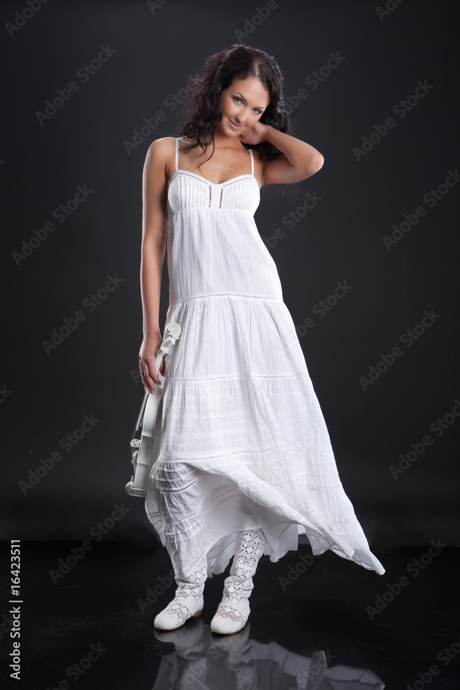 Naklejka premium Woman In White Dress