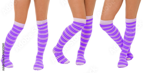 Pairs of women legs in purple socks