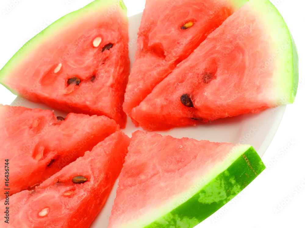 Fragment of sllice watermelon on plate, isolated on white. Fragment of sllice watermelon on plate, isolated on white.