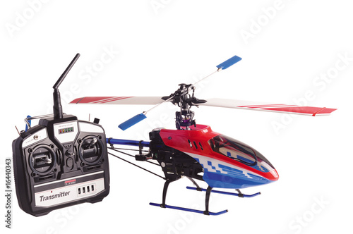 Helicopter model and radio remote control set isolated on white