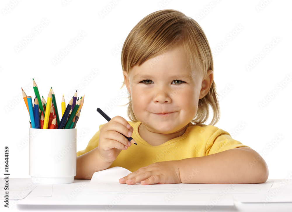 Child draw with crayons and smile Child draw with crayons and smile