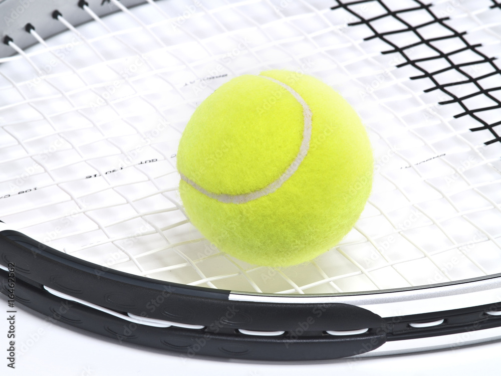 tennis racket with a ball on white