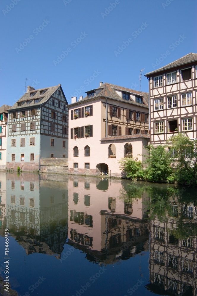 Alsace houses in Strasbourg, reflected in channel Alsace houses in Strasbourg, reflected in channel