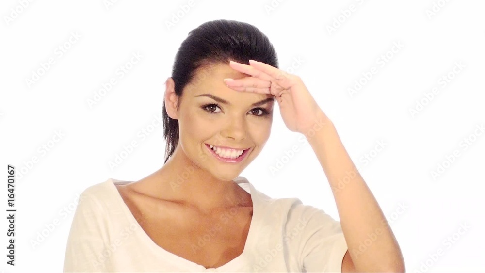 Smiling and beautiful woman looking around, she is isolated Smiling and beautiful woman looking around, she is isolated