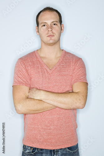 Photos Man Standing with Arms Crossed