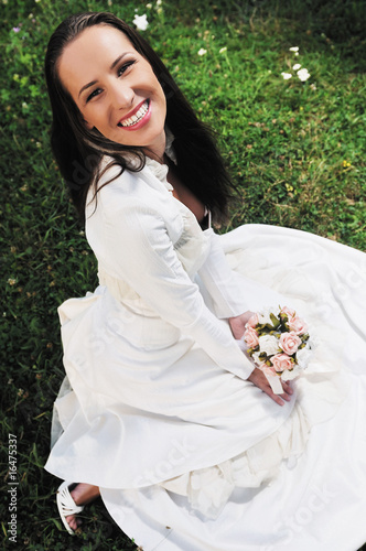 beautiful bride outdoor after wedding ceremny photo