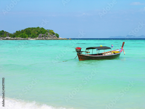 Longtail boat in Andaman sea, Lipe island, Thailand © karnizz