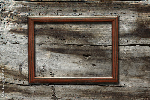 frame on old wooden background
