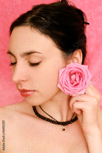 glamorous portrait of a girl with a rose