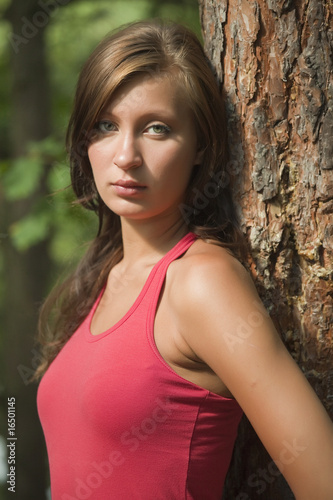 unhappy woman in forest