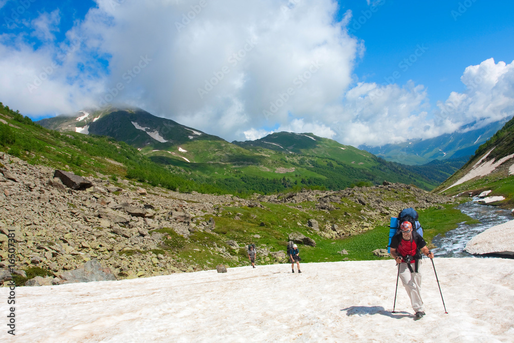 Hiker in Caucasus mountains