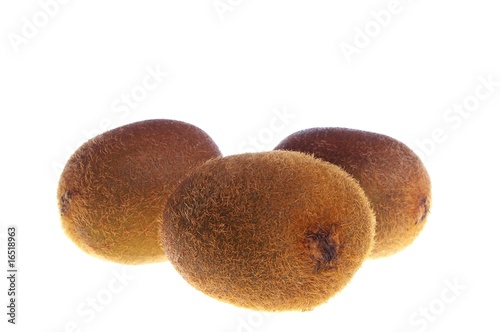 Three kiwi fruit isolated