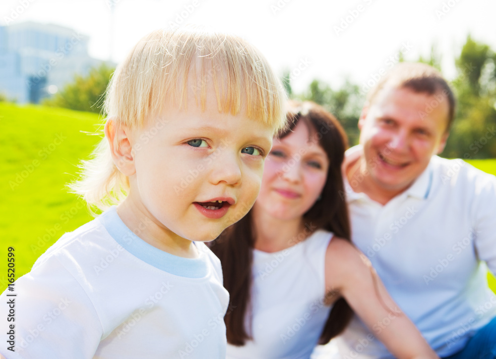 Fototapeta premium Boy with his parents