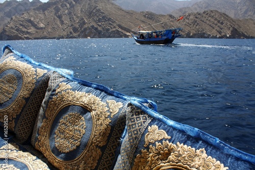 embroidered cushions and cruise in oman waters