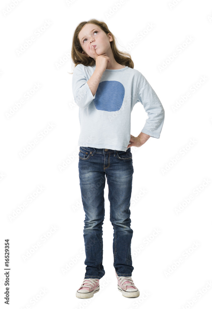 Young girl, finger raised to lips, looking upwards pondering Young girl, finger raised to lips, looking upwards pondering