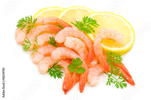 parsley,lemon and shrimps on white background