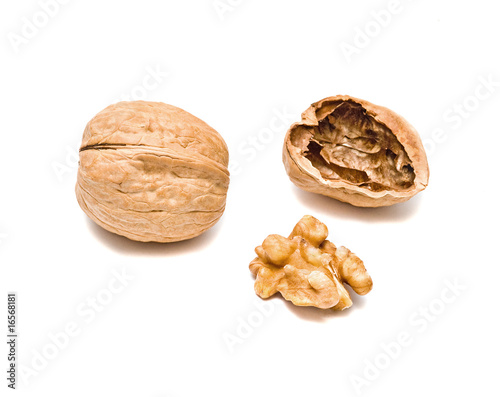 Cracked walnuts isolated on white background
