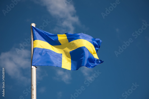Swedish flag against blue sky