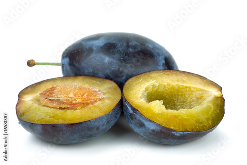 Whole plum and halves