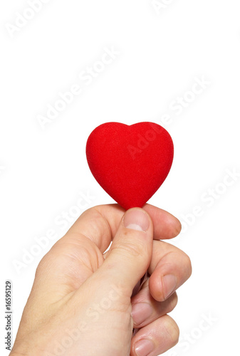 Small valentine heart in a hand.