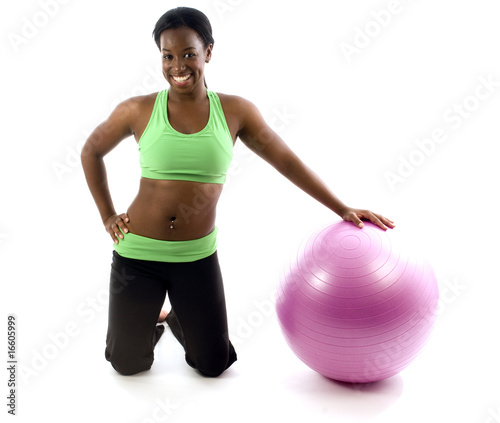 young pretty hispanic african american woman exercising with fit