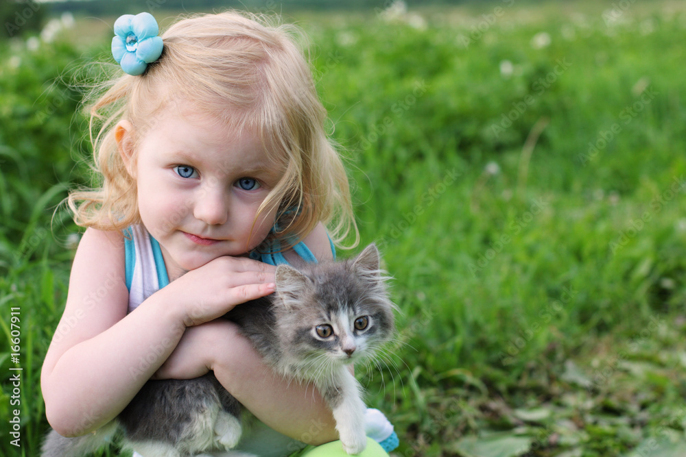 Obraz premium girl with cat outdoor
