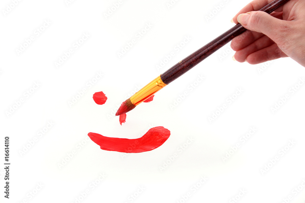 brush paints smile on paper brush paints smile on paper