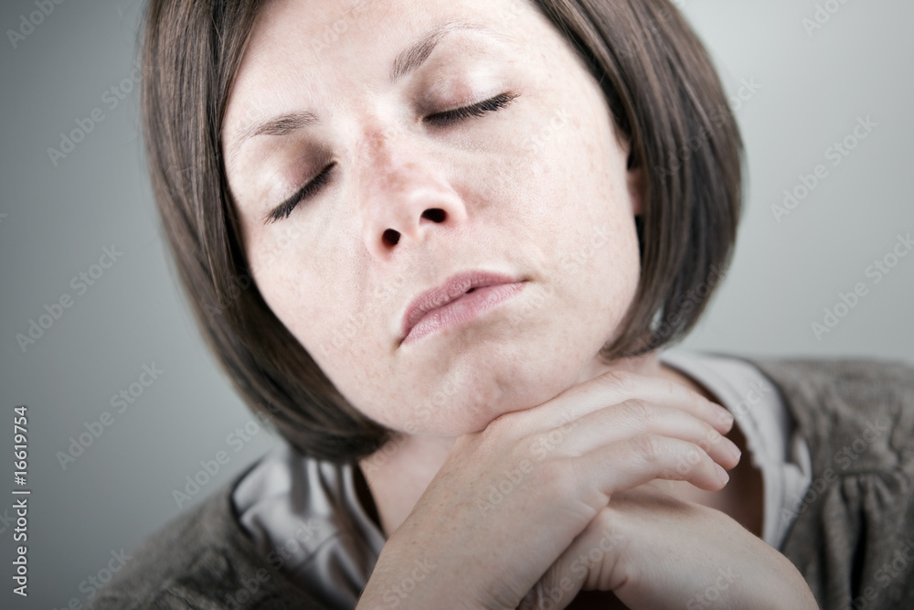 Attractive Brunette Resting her Head on her Hands Attractive Brunette Resting her Head on her Hands
